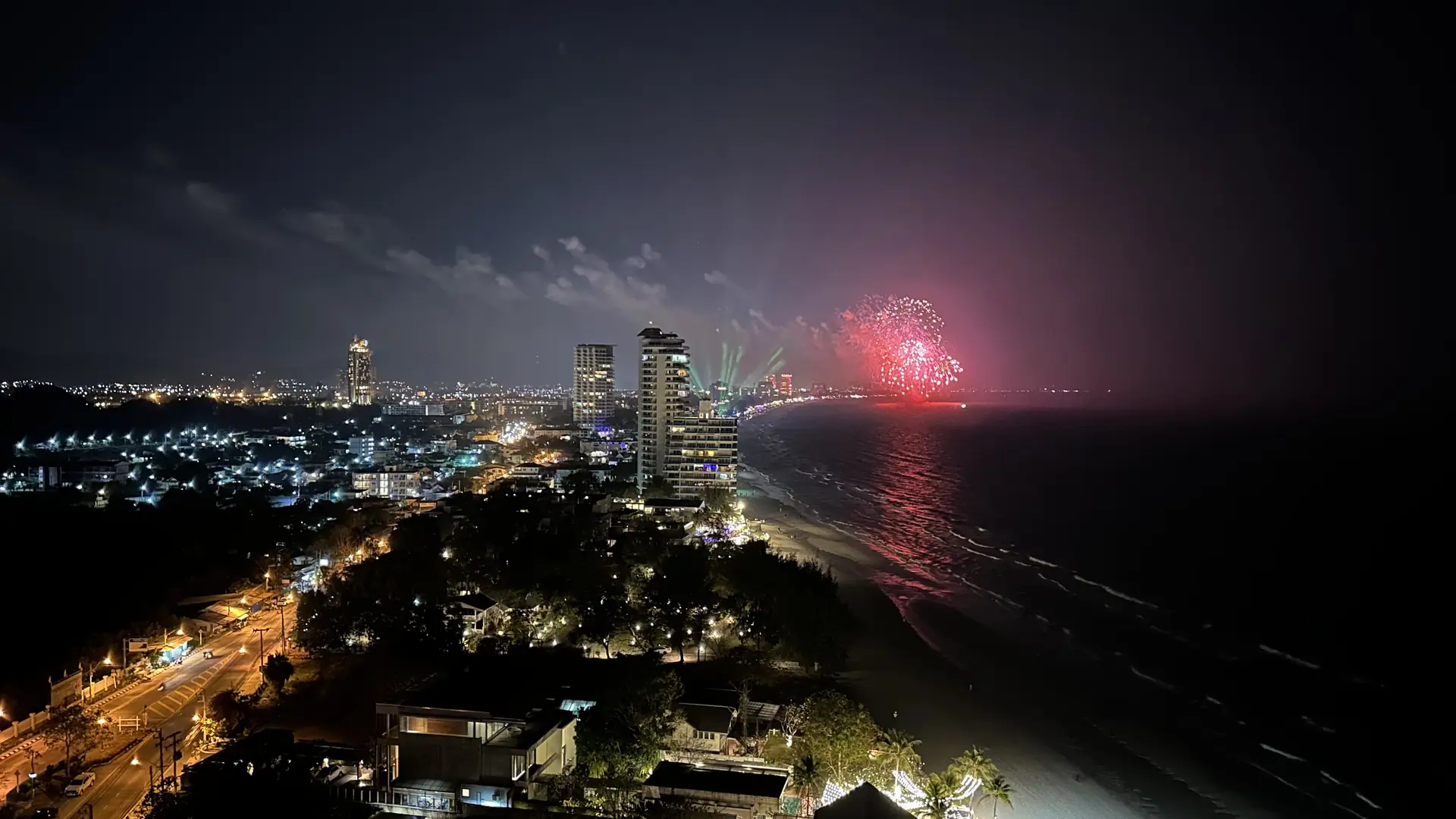 Fireworks over the Hua Hin coastline at night